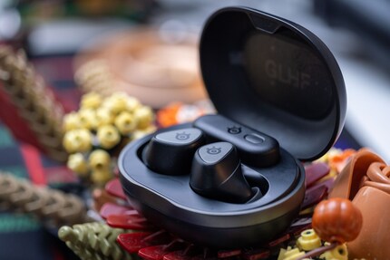 The charging case is huge compared to others. The reason for this is that the dongle also fits in it.